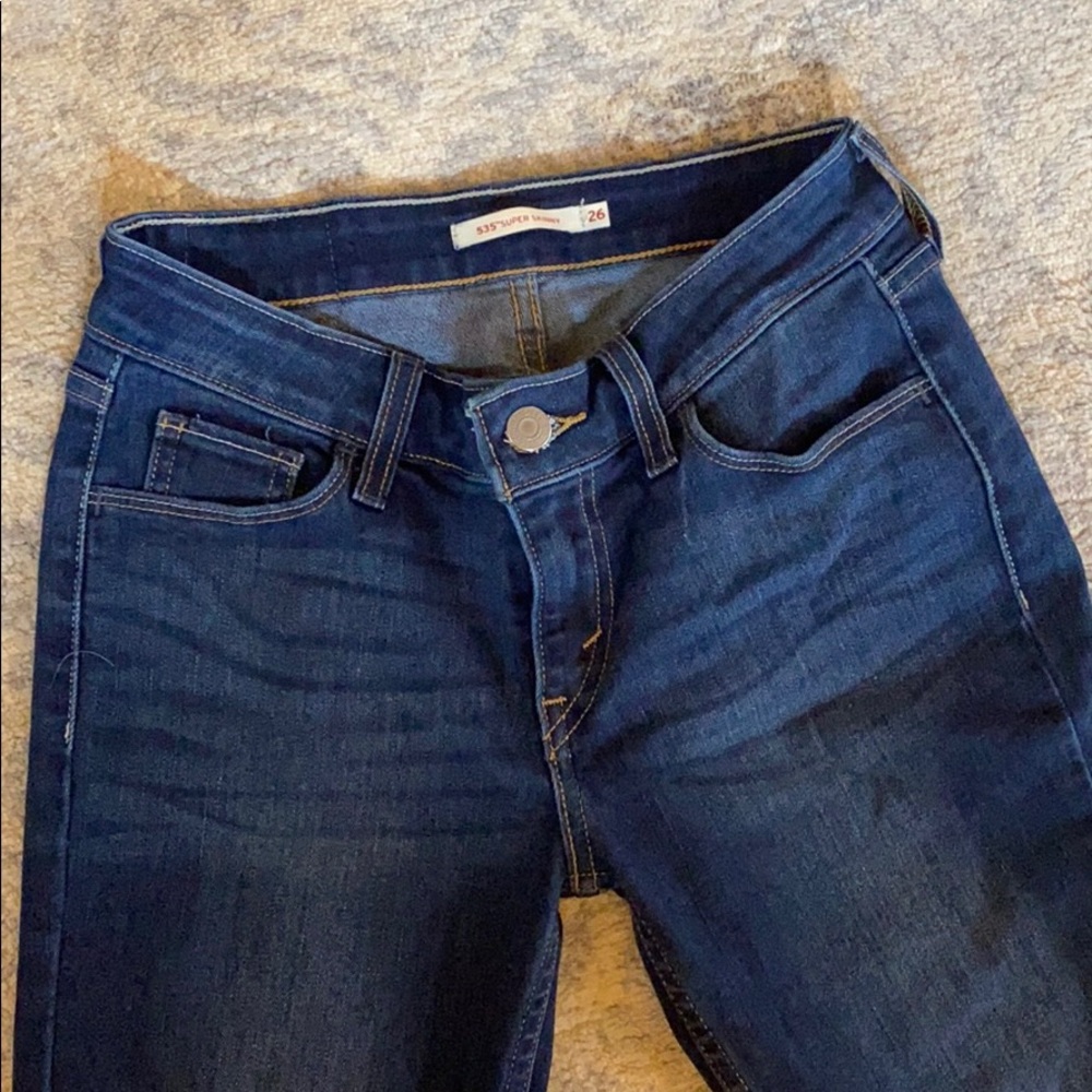 LEVI DARK WASH RAW HEM JEAN